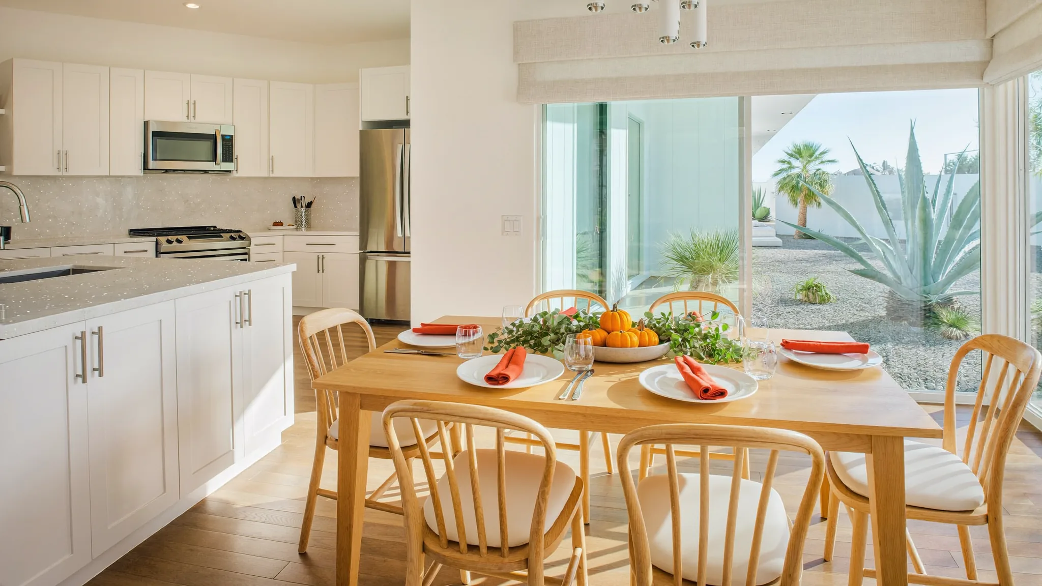 Thanksgiving cleaning checklist: a clean Las Vegas kitchen and dining table ready for guests