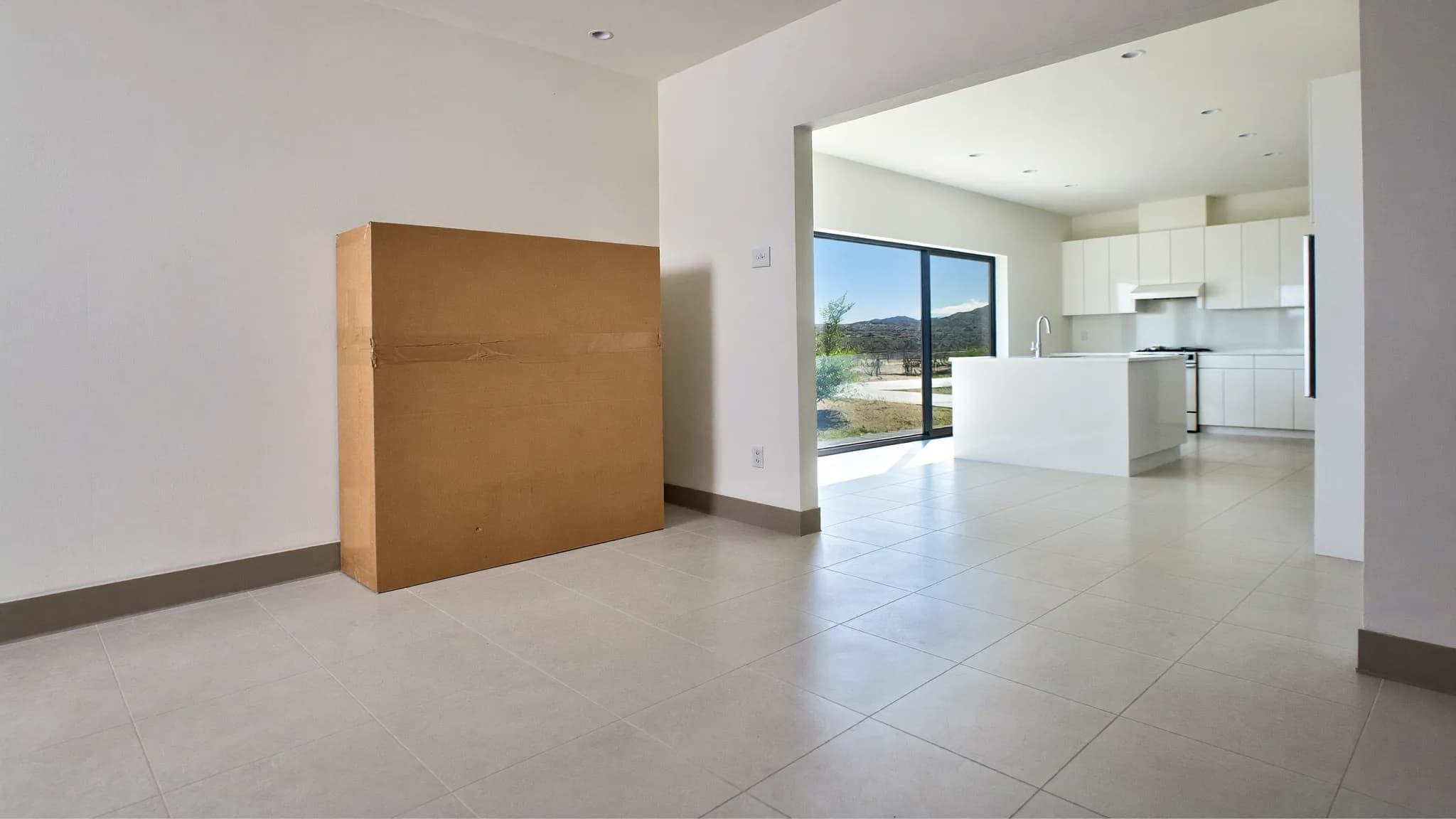 Empty Las Vegas living room and kitchen cleaned and ready for a move-in cleaning checklist